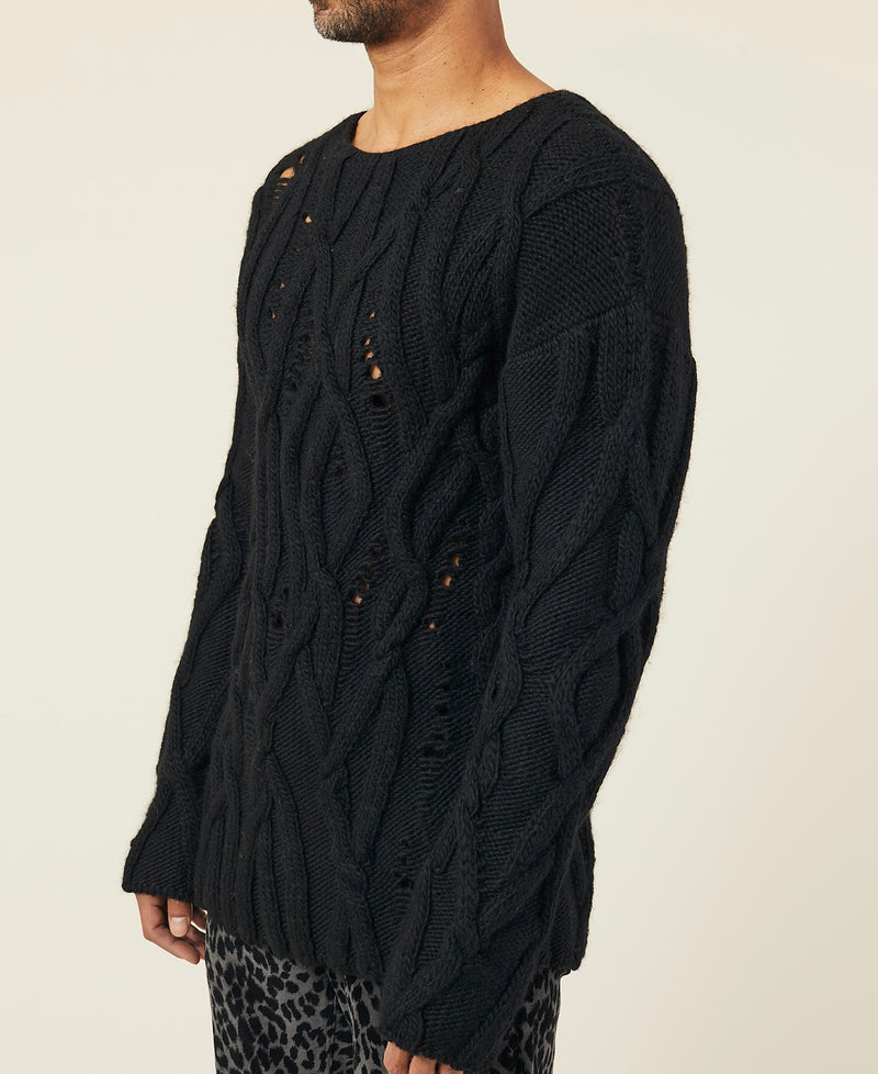 BLACK OVERSIZED DISTRESSED CABLE-KNIT SWEATER